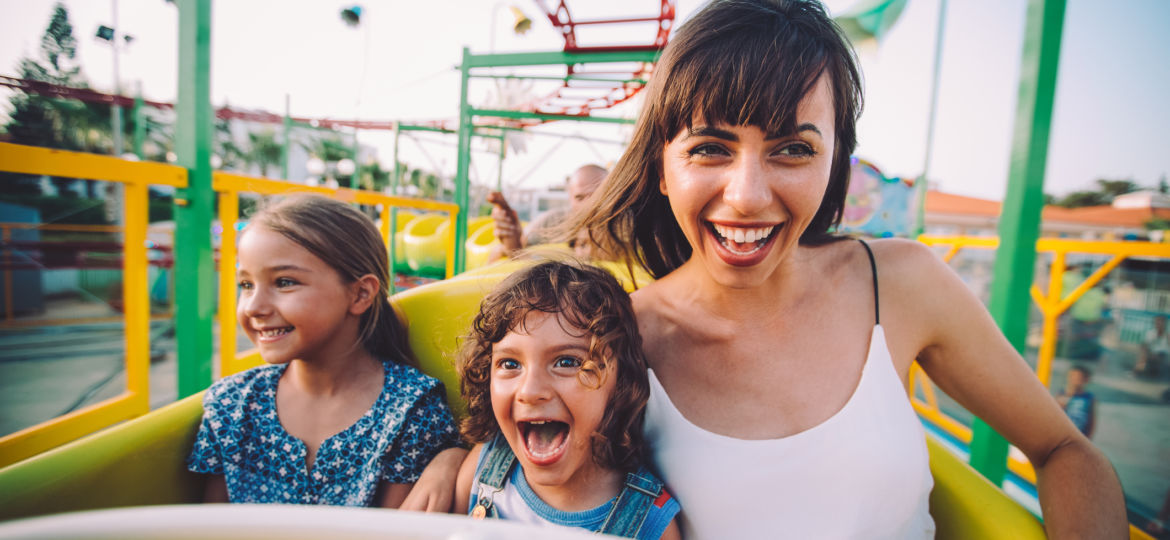 Mom and kids on rollercoaster